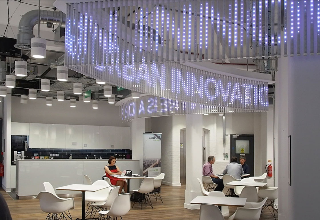 LED signage hanging over a cafe