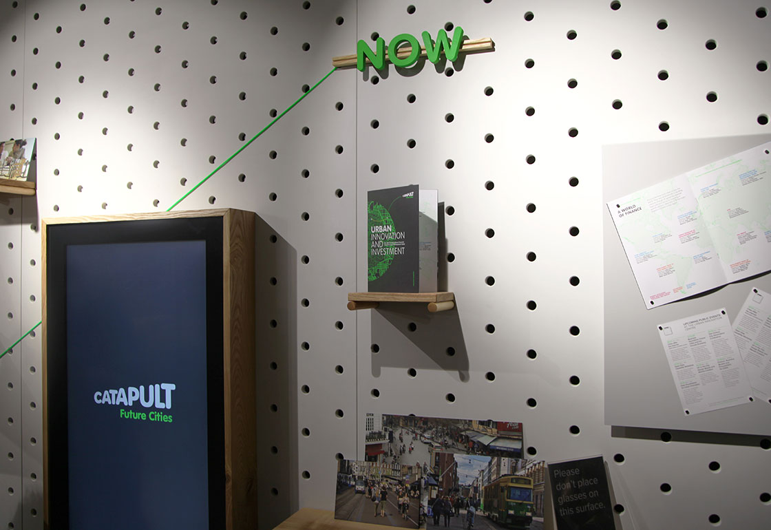 Pegboard wall with wood framed screen, wooden shelf and magnetic panel