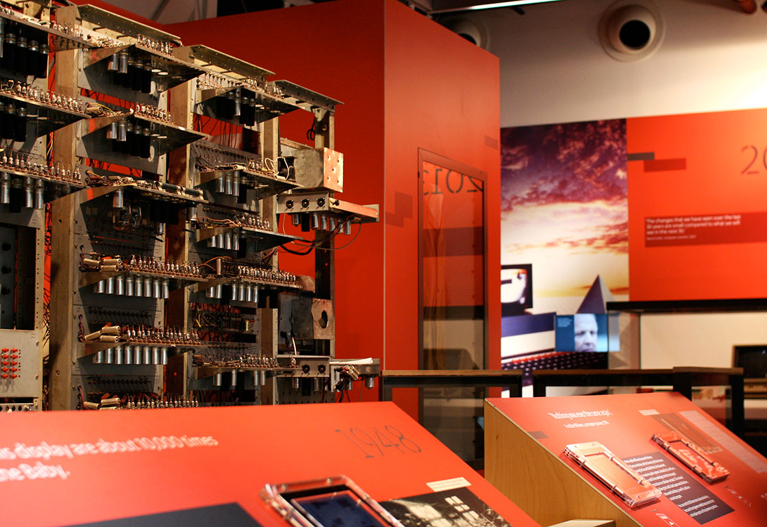 Exhibition graphics and an old computer