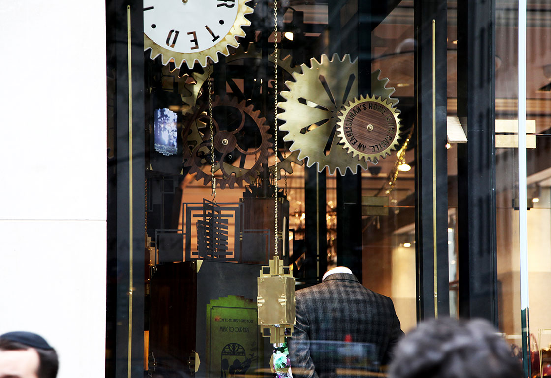 Window showing oversized clock parts